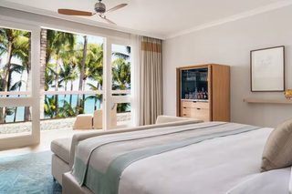 Premium bedding, free minibar items, in-room safe, desk