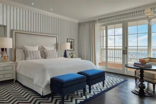 Premium bedding, down comforters, pillowtop beds, minibar